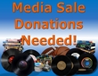 Text: Media Sale Donations Needed!, Background: DVD Pile, VHS Pile, Vinyl Records, Trading Cards, A Basketball, & A Football